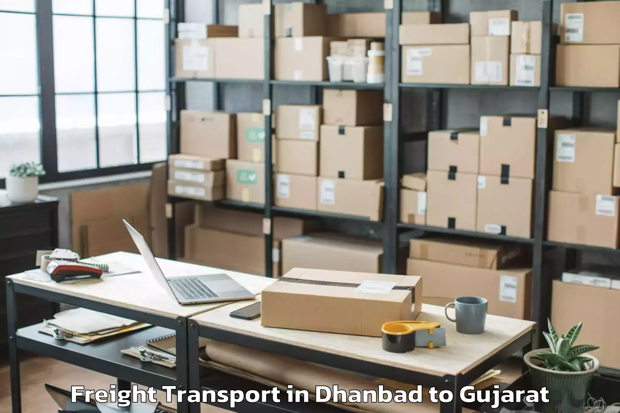 Book Your Dhanbad to Delvada Freight Transport Today